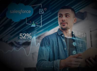 Man in denim shirt interacting with Salesforce data visualizations and analytics.